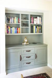 Alcove cupboard finished in F&B Pigeon with drawers