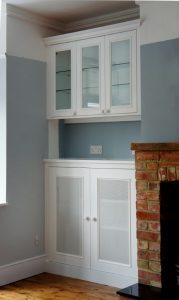 Built in alcove unit with glass doors