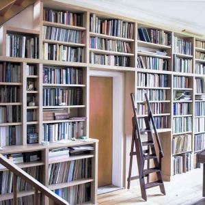 Built in Library bookcases in Oak on large wall