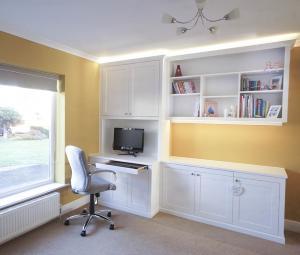 home office with built in cabinets