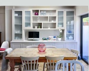 Fitted modern Display and storage cupboards in dining room