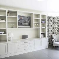 Large Built in unit with shaker doors and central display area and drawers