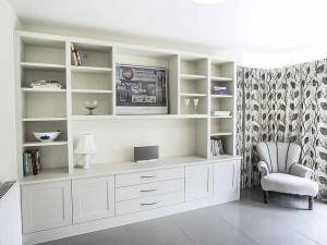 Large Built in unit with shaker doors and central display area and drawers