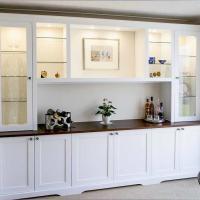 Large living room built in cupboards with glazed door display cabinets