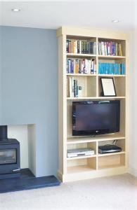 built in bookcase with TV in wood