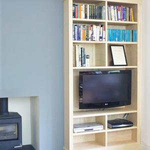 built in bookcase with TV in wood
