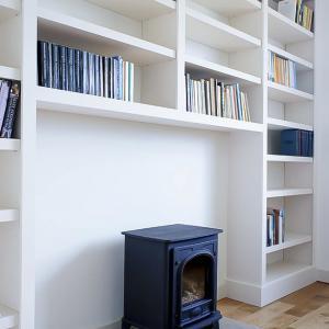 built in bookcases either side of fireplace