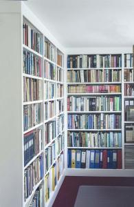 built in corner bookcases in white