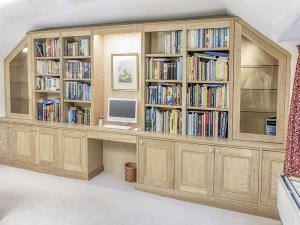 custom made fitted cupboards and shelving in Solid Oak