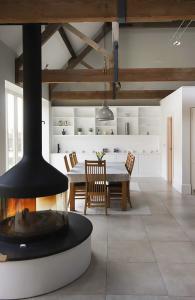 large fitted cabients and shelving in living room barn conversion