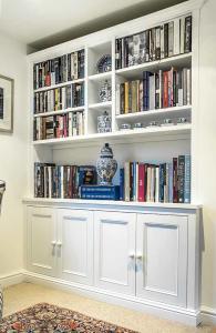 Fitted cabinets and shelving in traditional design