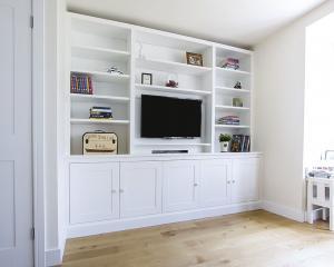 Large built in cupboards and TV Media unit
