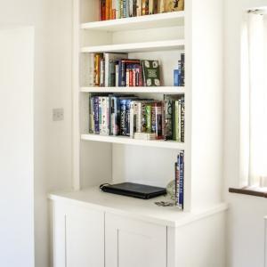 Modern styled alcove unit with panelled doors
