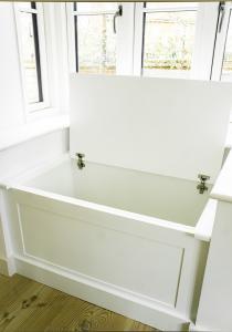 built in windorw seat cupboard