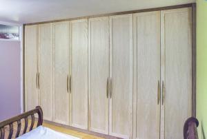 Wooden Built in wardrobe in Ash and Cherry wood