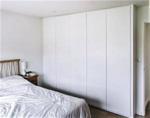 Modern contemporary fitted wardrobes in bedroom