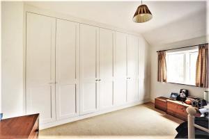 arge wall to wall fitted wardrobe in Bedroom