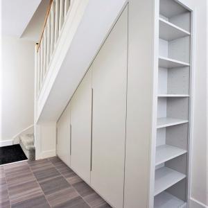 Modern built in wardrobe under stairs storage