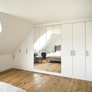 wall to wall modern fitted mirror wardrobe