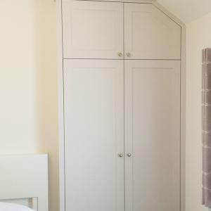 ALcove wardrobe with sloping ceiling