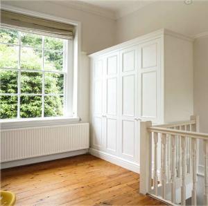 Built-in-wardrobe-in-period-Victorian-style-in-hallway