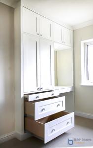 Wardrobes fitted in to an alcove