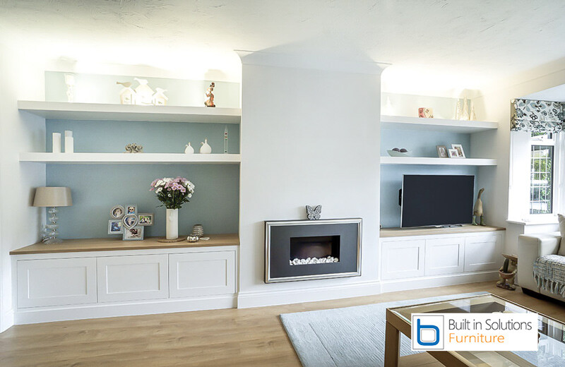 Built-in-cabinets-and-shelving-with-TV-space-with-false-chimney-breast-and-electric-fire