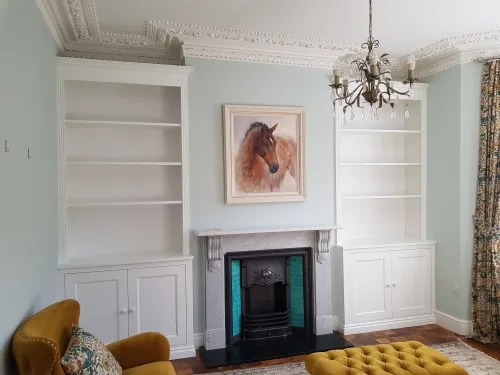Traditional Fitted Alcoves areound a Fireplace in Victorian home in Amersham