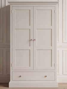 A face-on sample photo showcasing a traditional two-door wardrobe featuring a 3-panel Shaker door design built above a wide base storage drawer with small knob handles.