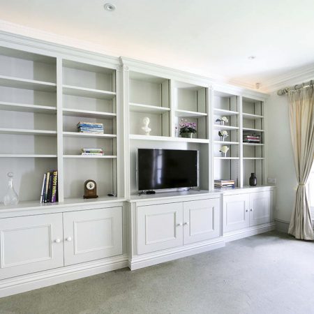 Bespoke traditional breakfront fitted living room cupboards with open shelving period style joinery Oxfordshire