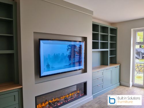 False chimney breast with electric fire inset