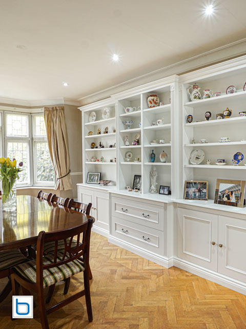 Fitted dining room furniture in grand Victorian style — large formal dining room with period display unit and herringbone parquet