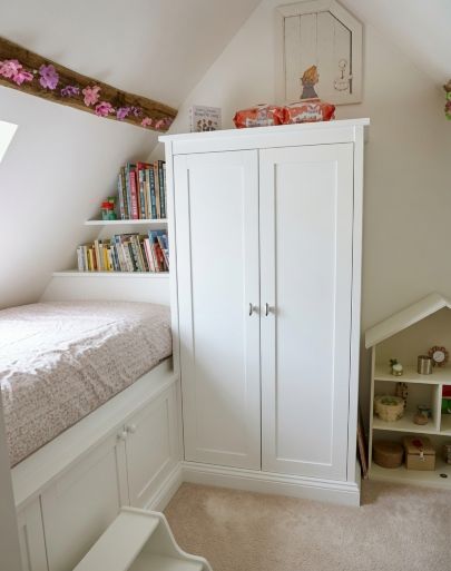 Bespoke fitted Shaker wardrobe and custom cabin bed built into a sloped ceiling children's bedroom