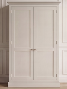 A face-on sample photo showcasing a traditional two-door Shaker wardrobe style with inset panels, round knobs, a decorative crown cornice, and a molded plinth base.