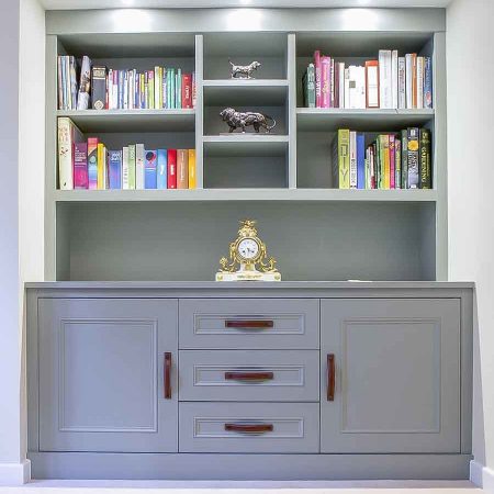 Victorian style alcove units painted in Farrow and Ball Pigeon with leather handles and open display area