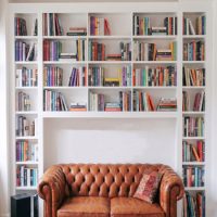 Floor to ceiling fitted bookcase — bespoke built-in shelving for book collections
