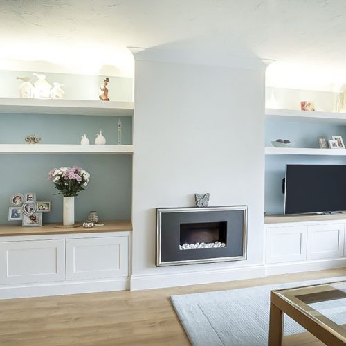 uilt in cabinets and shelving with TV space