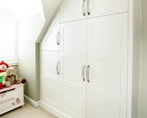 Built in wardrobes in loft in shaker style