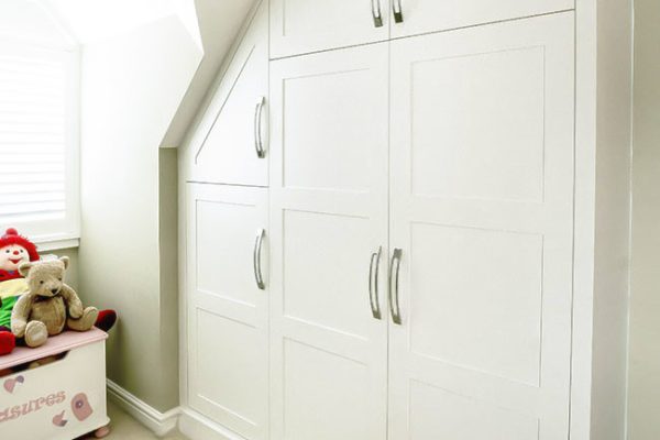Built in wardrobes in loft in shaker style
