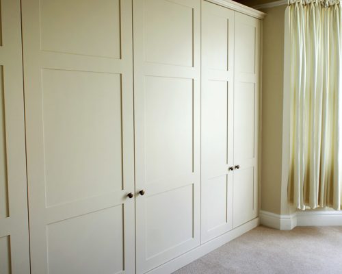 Fitted wardrobes in a bedroom