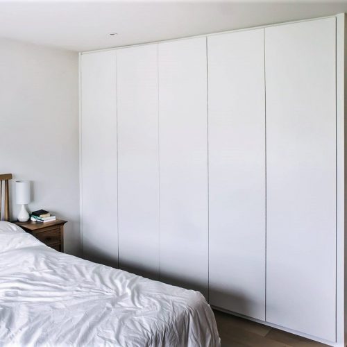 Modern contemporary fitted wardrobes in bedroom
