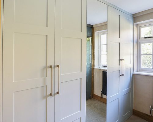 Modern fitted shaker wardrobe with mirror door