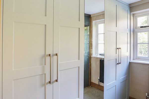 Modern fitted shaker wardrobe with mirror door