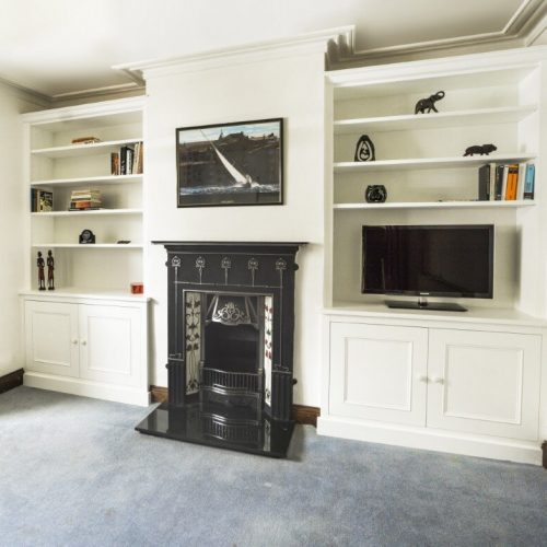 Ornate styled alcove Cupboards with traditional features
