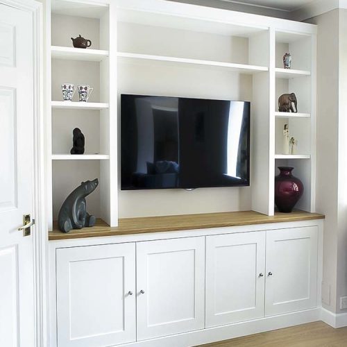 Shaker built in cupboards with space for TV