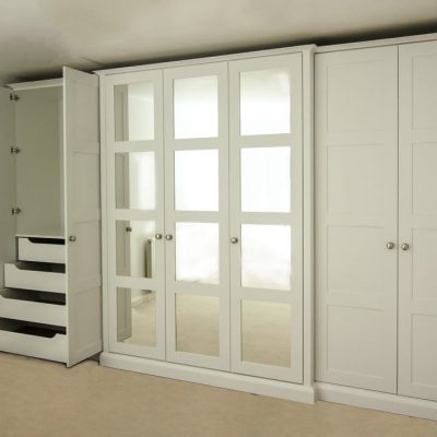 Wall-to-wall-shaker-wardrobe-with-mirrors-and-Break fornt