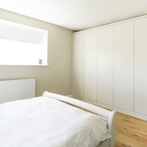 modern contemporary built in wardrobe fitted to bedroom