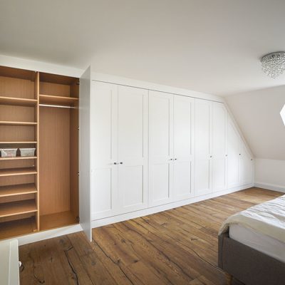 wall to wall white shaker built in wardrobe