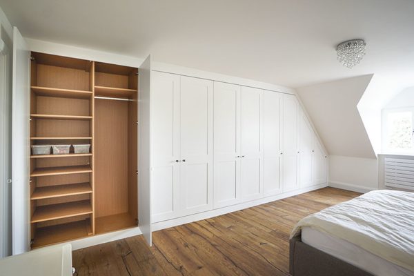 wall to wall white shaker built in wardrobe